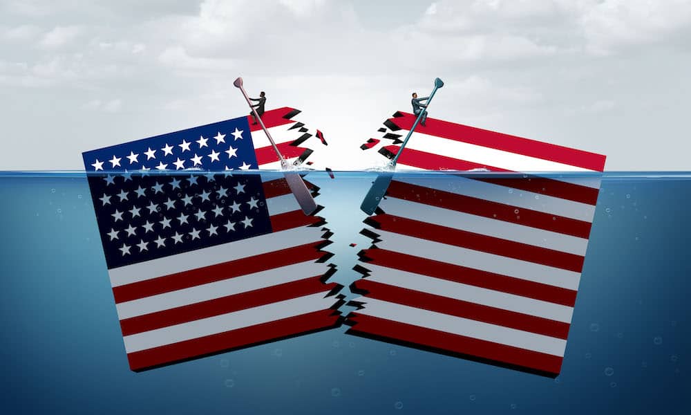 USA Flag ripped in half and in water.