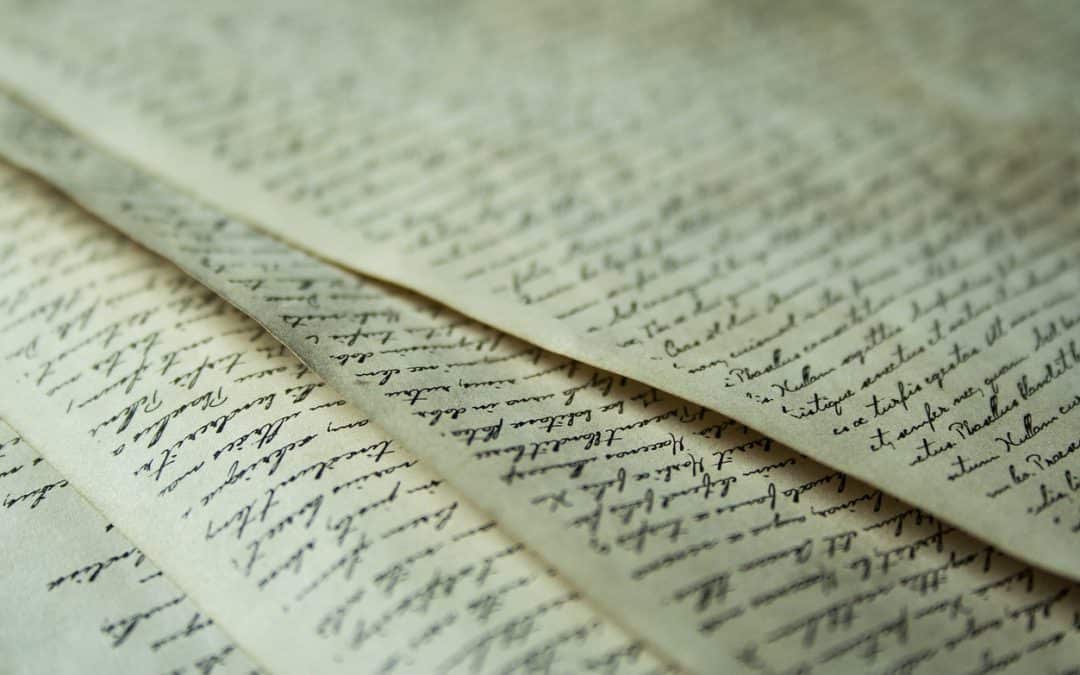 old writing paper with cursive writing